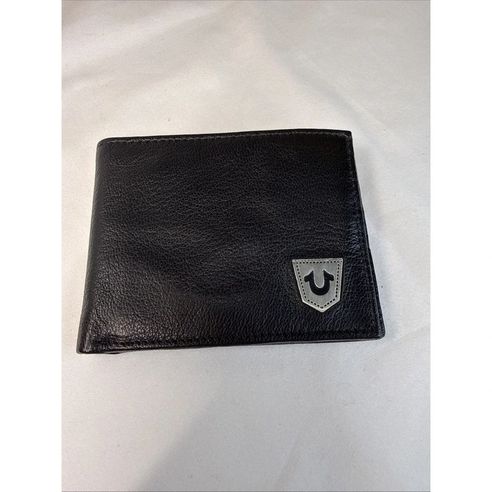 True Religion Men's Genuine Leather Black Bifold Wallet RFID Metal Logo.